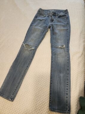 Women’s Medium Blue Distressed Skinny Jeans
